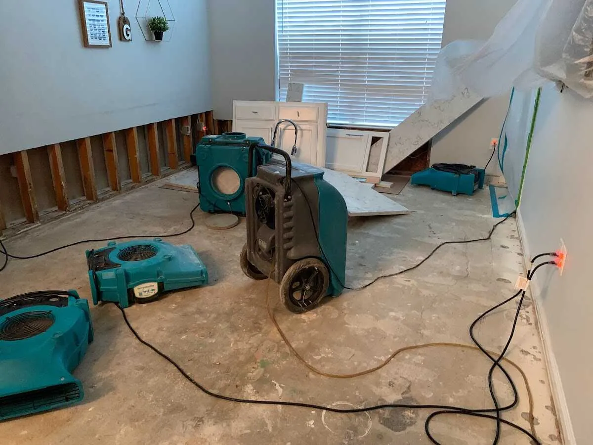 Dehumidifier in flood-cut room for Water Damage Restoration in Woodcliff Lake
